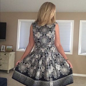 Dress with slimming mid section and tie